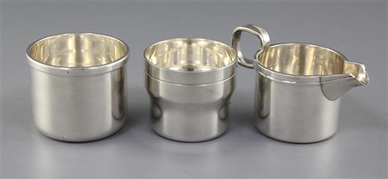 A 1970s Irish silver cream jug, sugar bowl and beaker by Rionore or Kilkenny Ltd, 12.5 oz.